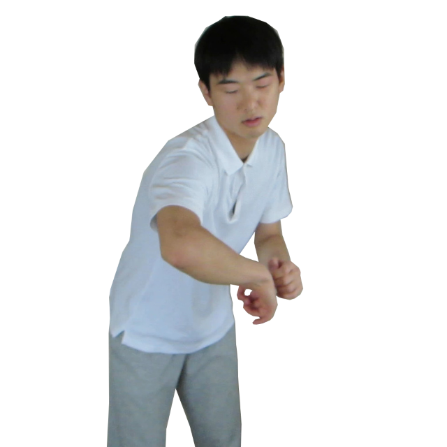 体の前方のお腹の高さにある何かを肘で操作している。